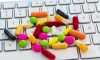 many pills and computer keyboard. photo icon for online and internet pharmacy.